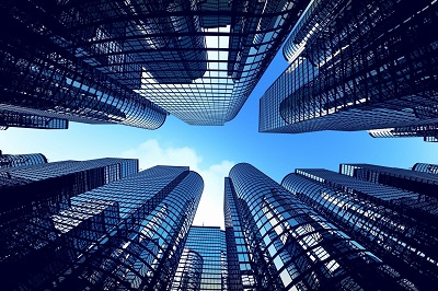 A view of some skyscrapers from below the ground.