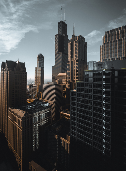 A city with skyscrapers and a sky background